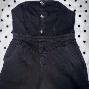 Black denim strapless romper.